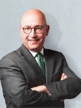 Attorney Alan J. Tauber in  